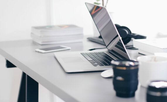 Free Gray Laptop on Table Top Stock Photo