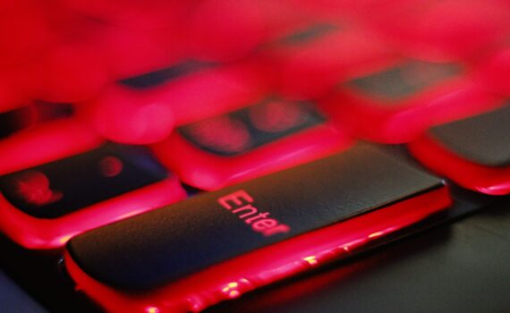 a close up of a red and black keyboard