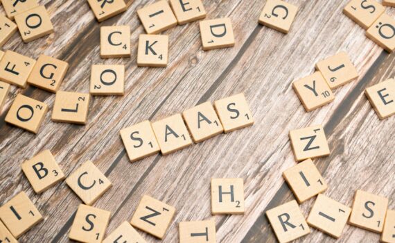 scrabble-letters-spelling-saas-on-a-wooden-tabl